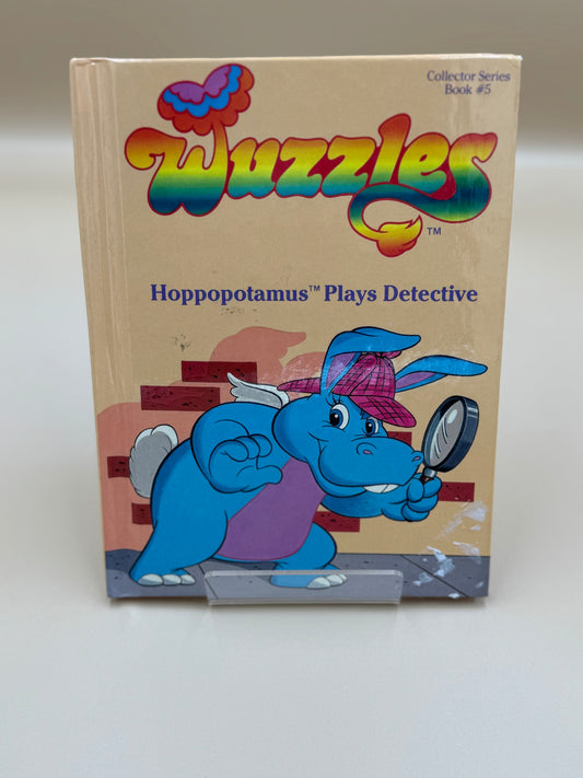 Book titled 'Hoppopotamus Plays Detective' from the Twuzzles series on a white background